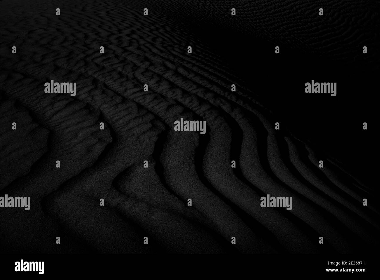 Black and white dark texture of desert sand dunes Stock Photo