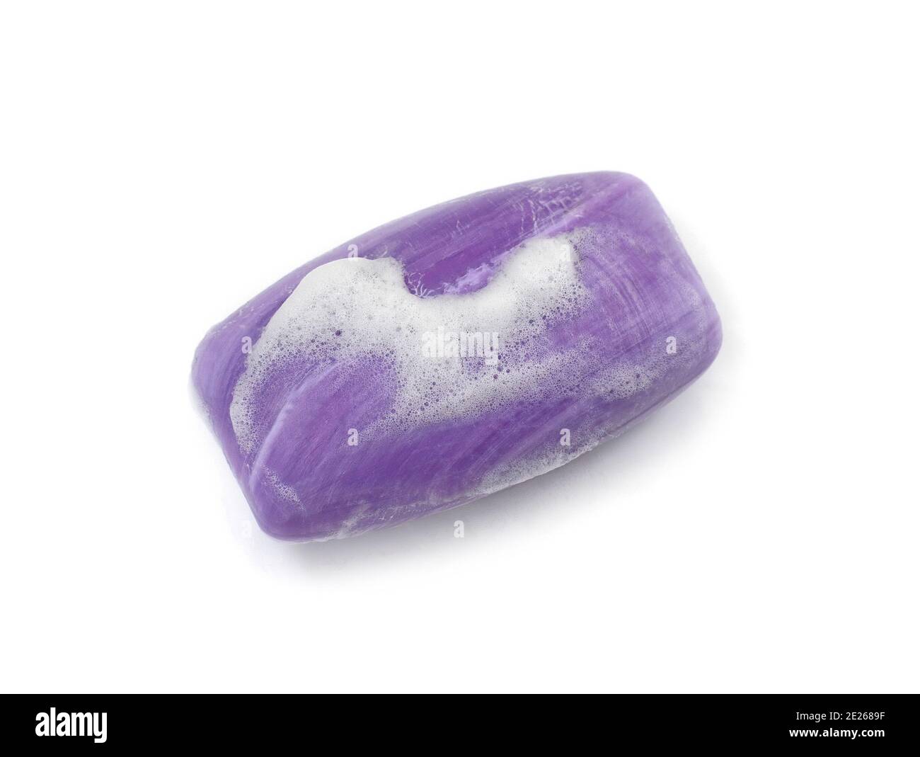 Soap bar with foam isolated on white background. Wet bar of soap Stock