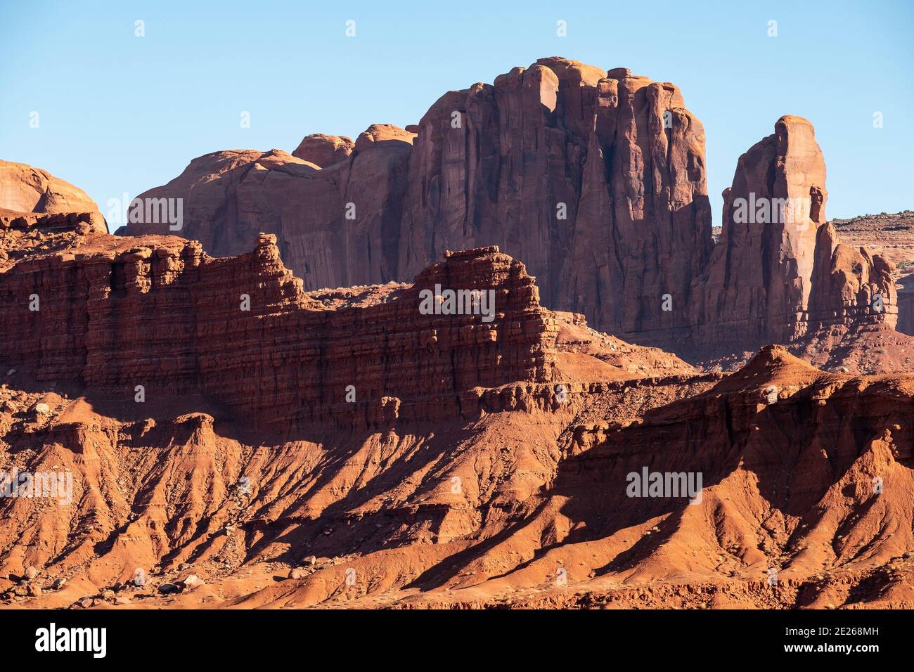 Red sandstone rocks in Monument Valley Navajo Tribal Park, in the Colorado Plateau, Arizona and Utah, USA Stock Photo