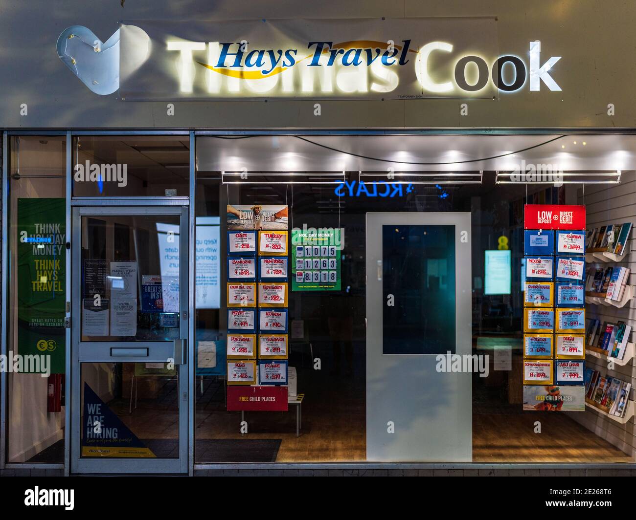 Hays Travel Agency - former Thomas Cook Travel Agency taken over by Hays Travel in 2019. Temporary Hays Travel Signage over the Thomas Cook Sign. Stock Photo