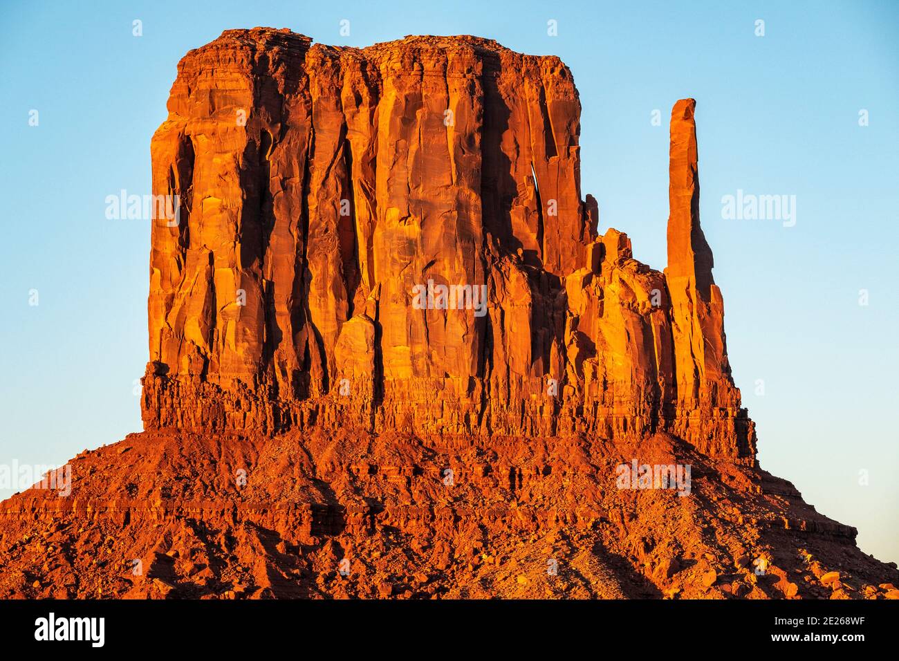 Sunset on the West Mitten rock formation in Monument Valley Navajo