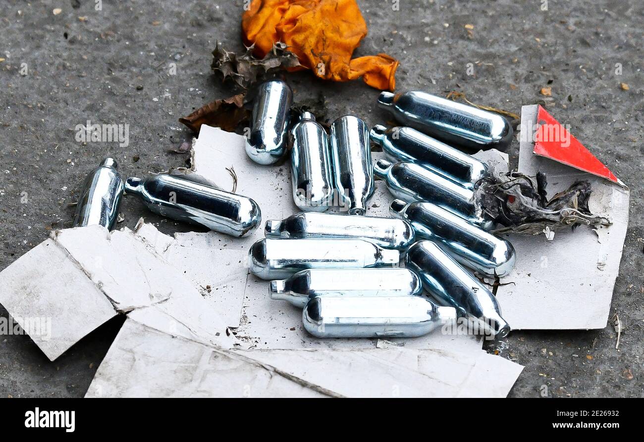 Nitrous Oxide cannisters on the street in Leicester, UK. Stock Photo