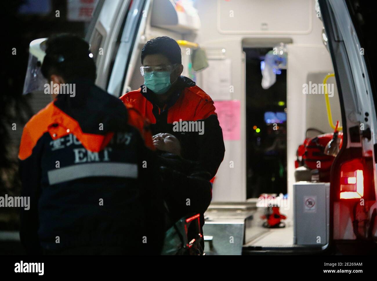 Taioei Taipei Taiwan 13th Jan 2021 Paramedics Wearing Face Shields And Masks Deliver A Patient To The Accident And Emergency Unit Of A Hospital Amidst Four New Locally Transmitted Cases Of Covid 19