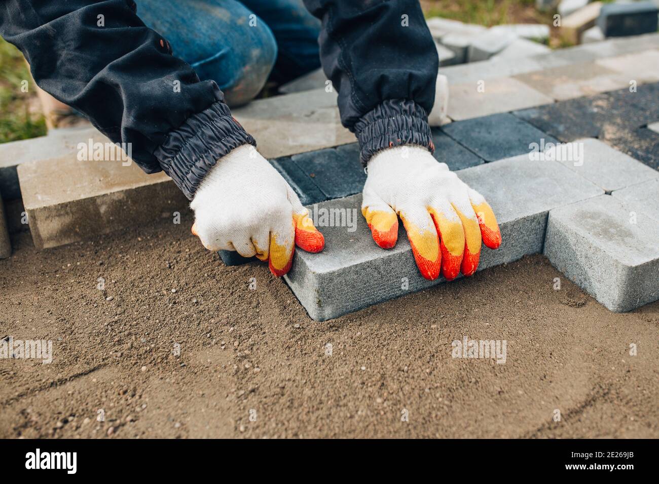 Bonding granite tiles to concrete subfloors outside the house porch