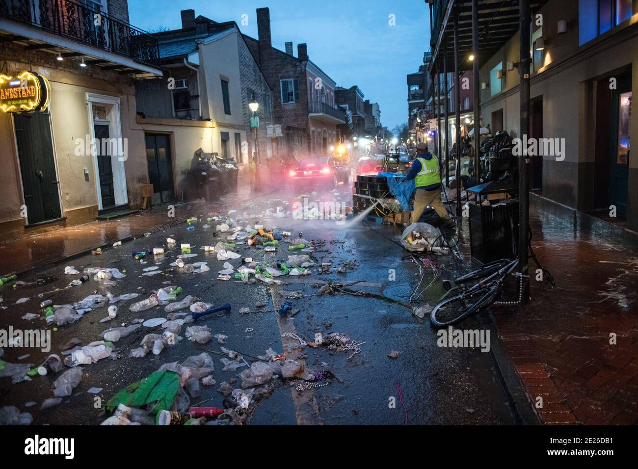 Cleanup after Mardi Gras Parade on St. Charles Avenue in New Orleans, Lousiana, USA. Stock Photo
