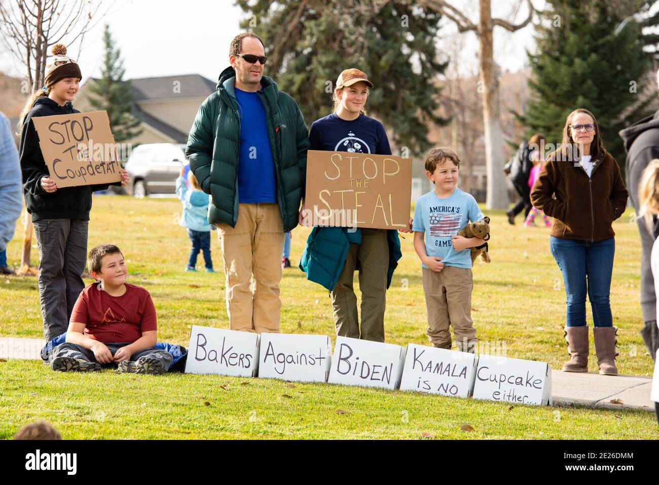 Helena, Montana / Nov 7, 2020: Protesters at 'Stop the Steal' rally, children holding signs president elect Joe Biden and Kamala Harris, election was Stock Photo