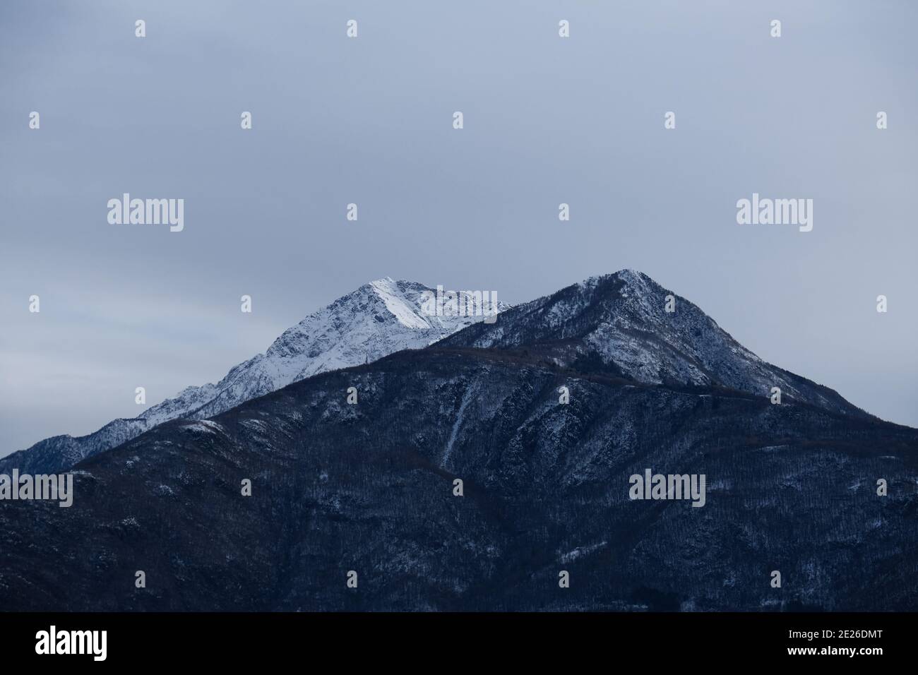Two mountain peaks covered hi-res stock photography and images - Alamy