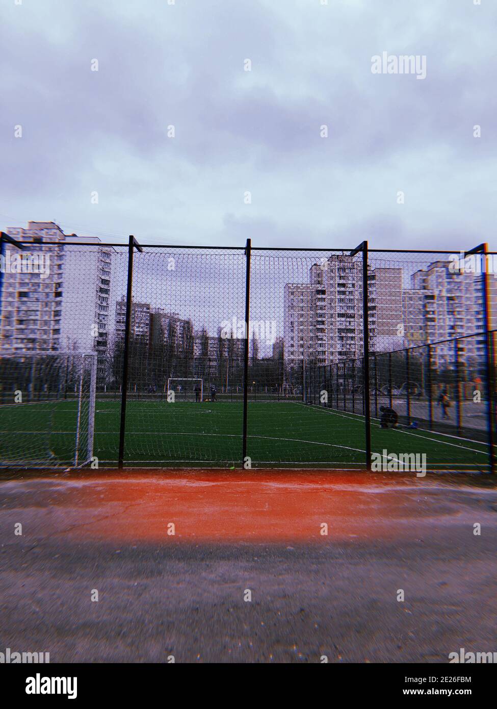 Metal safety net closeup of a soccer field, outdoor sports game Stock