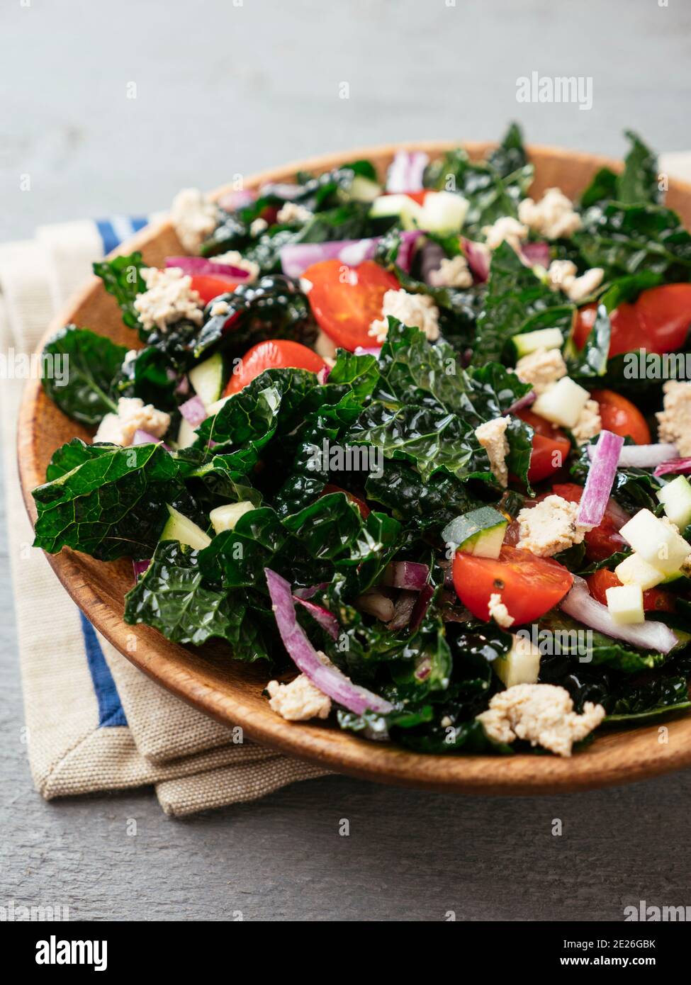 Homemade Greek style kale salad with home made vegan feta Stock Photo