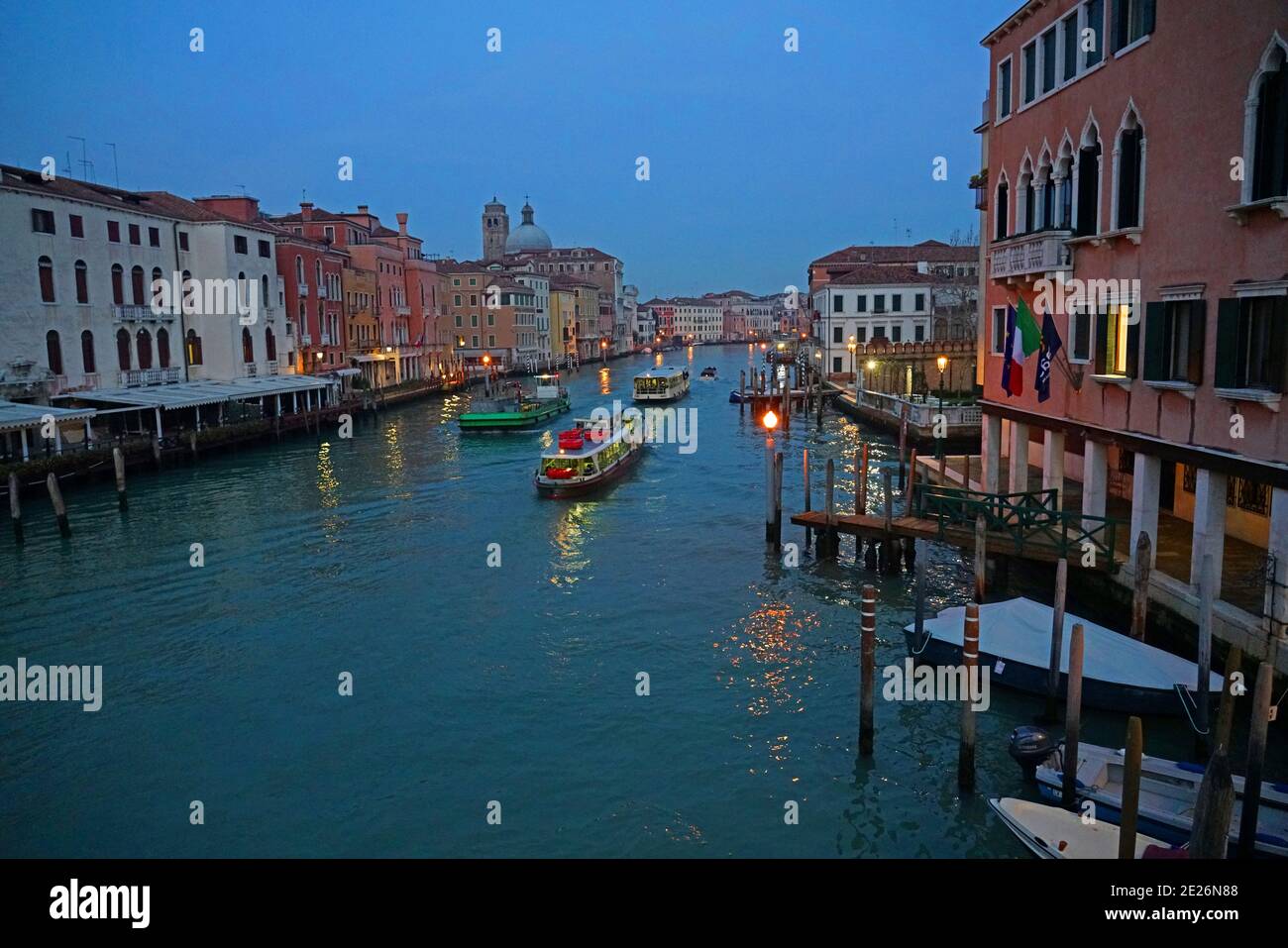 Boats on the Grand Canal in the World Heritage city Venice in Italy. Stock Photo