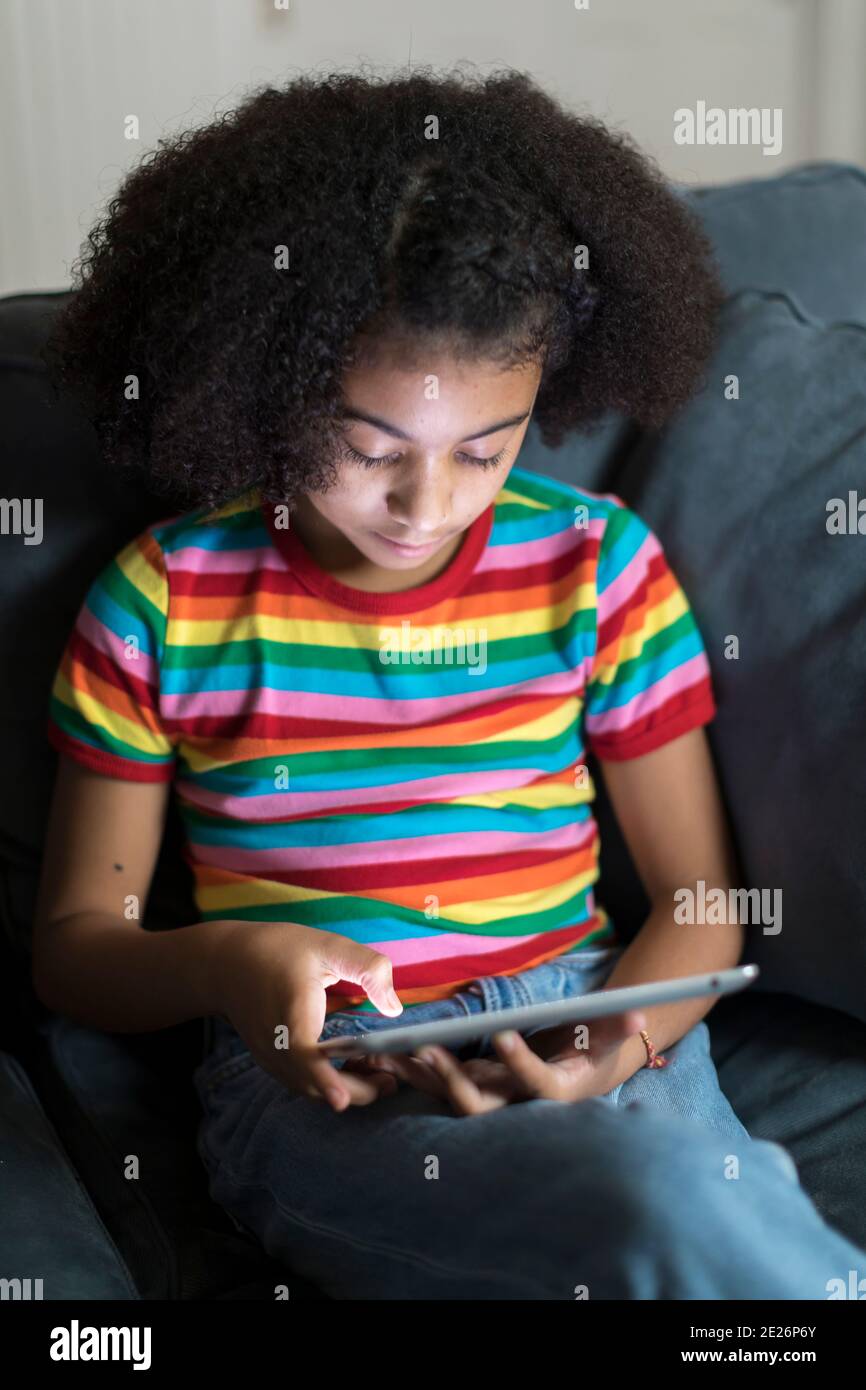 Eleven Year Old Africanamerican School Girl Playing Video Games Online  Stock Photo - Download Image Now - iStock