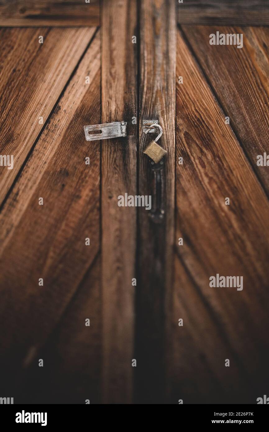 Unlocked door on a rustic building Stock Photo Alamy