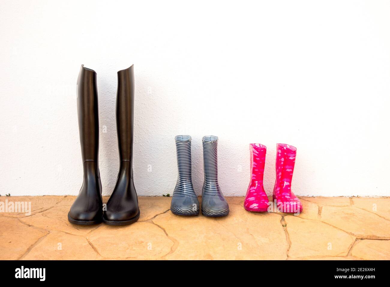 adult and children's water boots, horizontal image, family concept Stock Photo