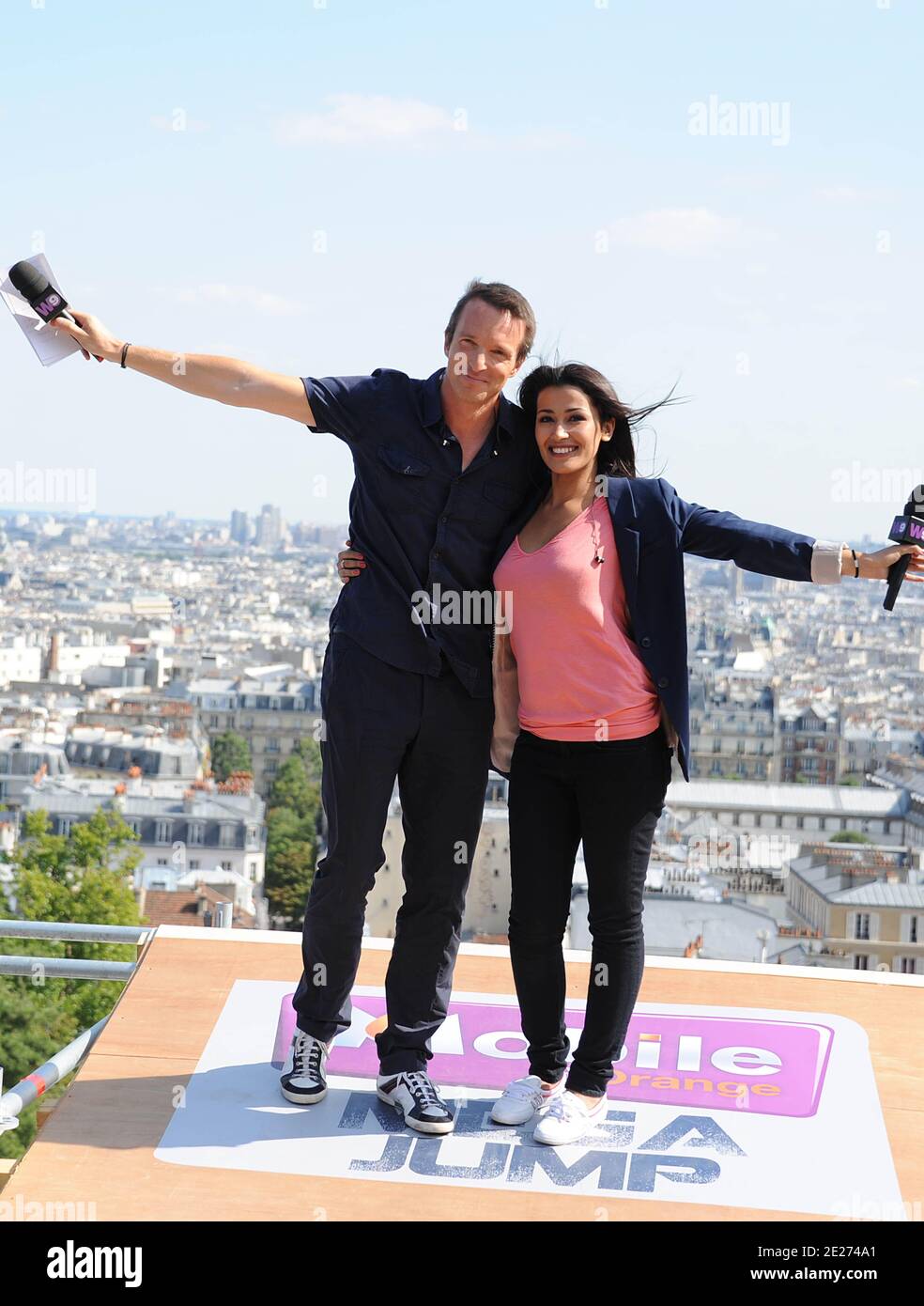 TV Anchors Stephane Rotenberg and Karima Charni present the World roller champion Taig Khris breaks the long jump world record from the top of Paris' Butte Montmartre in Paris, France on Saturday, July 2nd, 2011, Seen here is with his mother Aleka the sportsman dashes down from the Sacre Coeur in Montmartre and he smashes the long jump world record in roller (29m). Photo by ABACAPRESS.COM Stock Photo