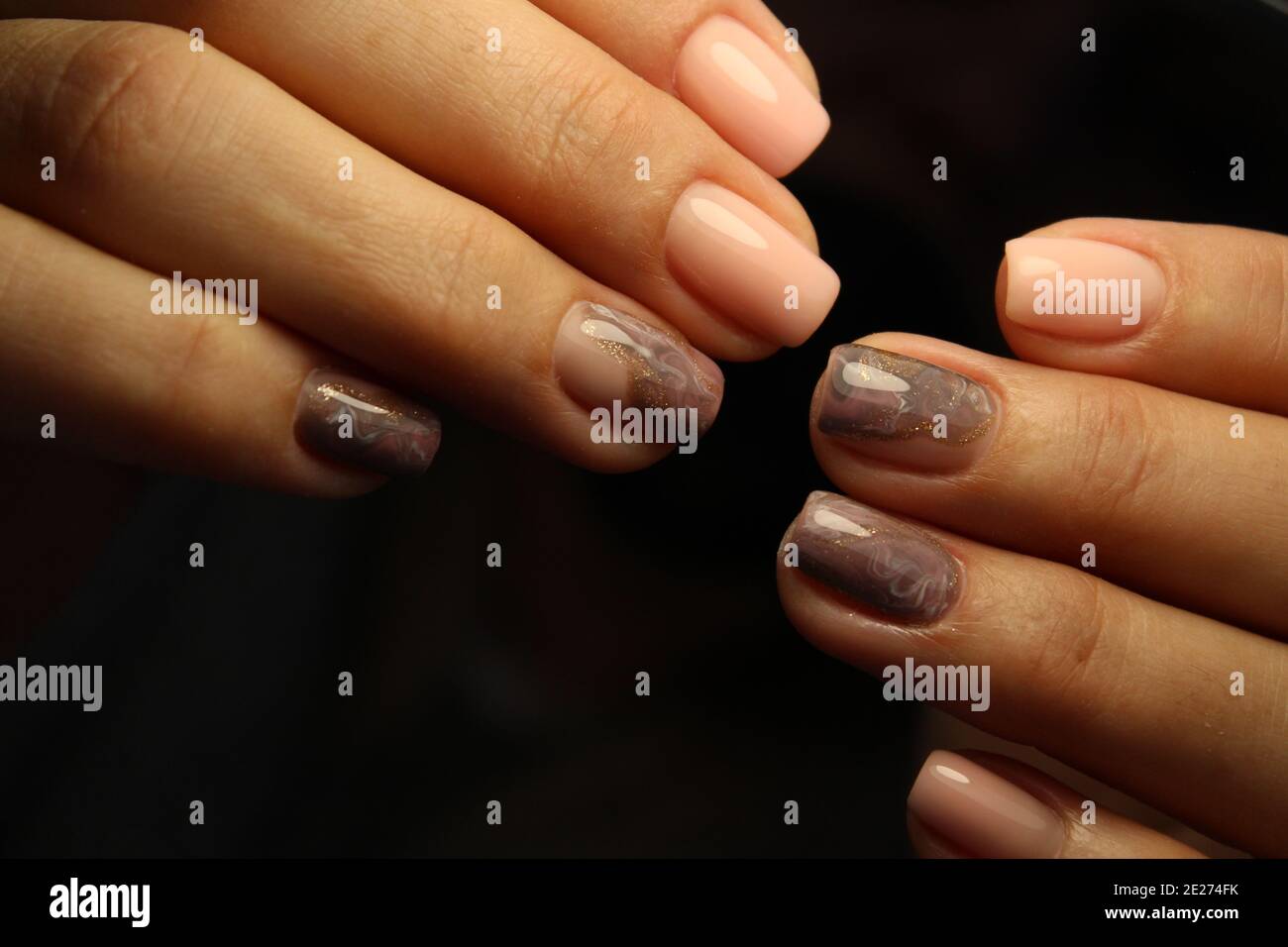 Closeup photo of a beautiful female hands with elegant manicure and ...
