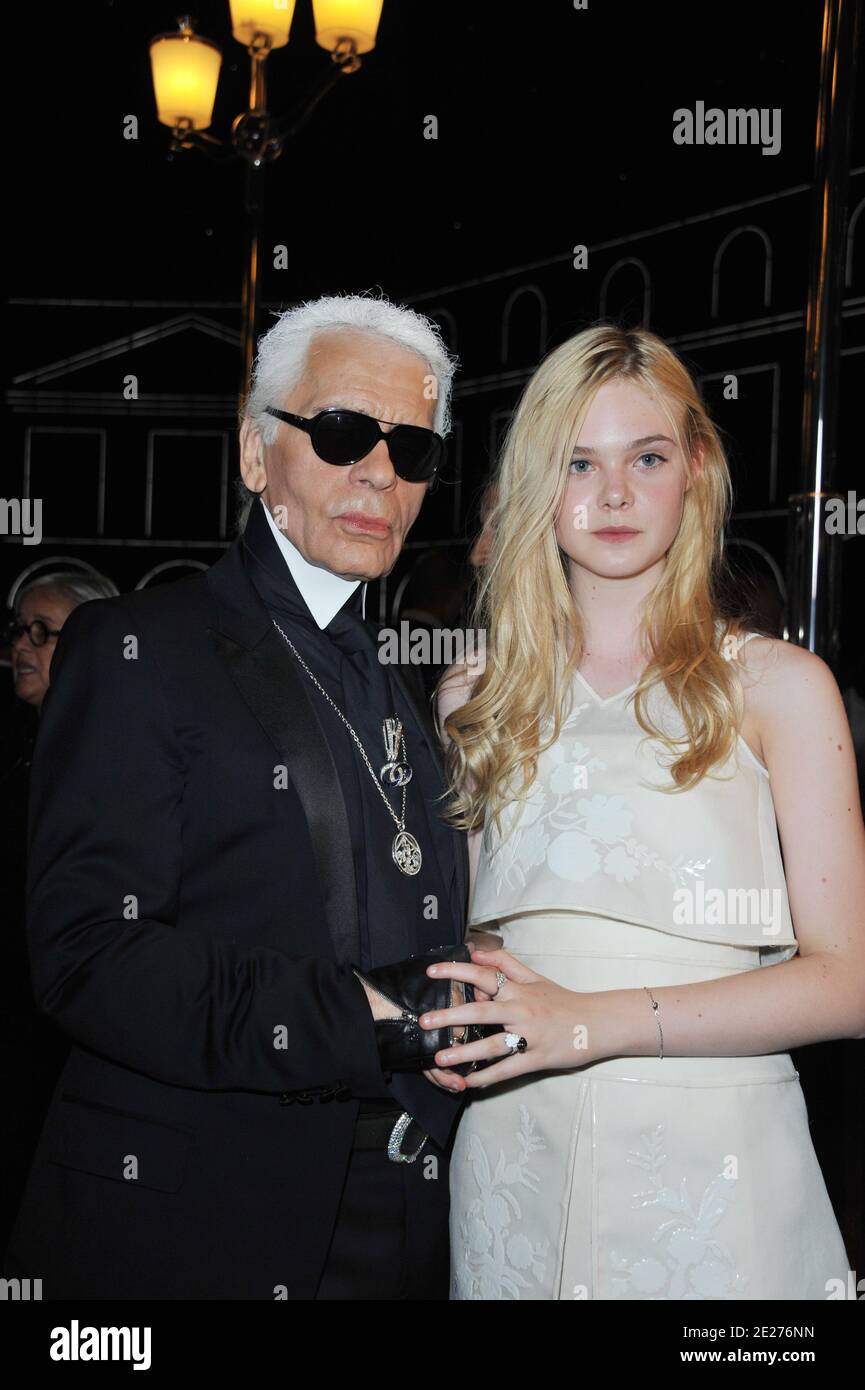Karl Lagerfeld with Elle Fanning attending the Chanel Haute-Couture  Fall-Winter 2011-2012 collection presentation held at the Grand Palais in  Paris, France on July 5, 2011. Photo by Thierry Orban/ABACAPRESS.COM Stock  Photo 