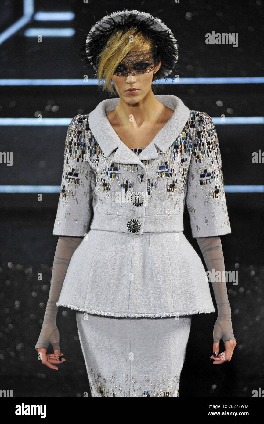 A model wears a creation designed by Karl Lagerfeld for Chanel