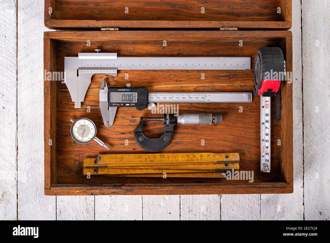 Measuring tools in a wooden case. Accessories for engineers to take