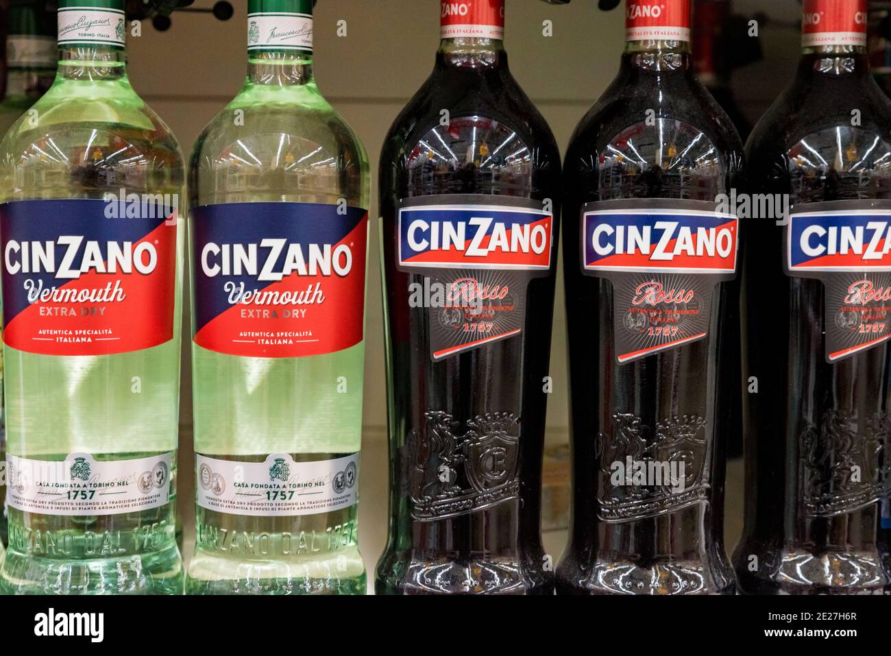 ROSTOV-ON-DON, RUSSIA - CIRCA NOVEMBER 2019: line of Cinzano Vermouth and Cinzano rosso bottles. Cinzano is an Italian brand of vermouth, a brand owne Stock Photo