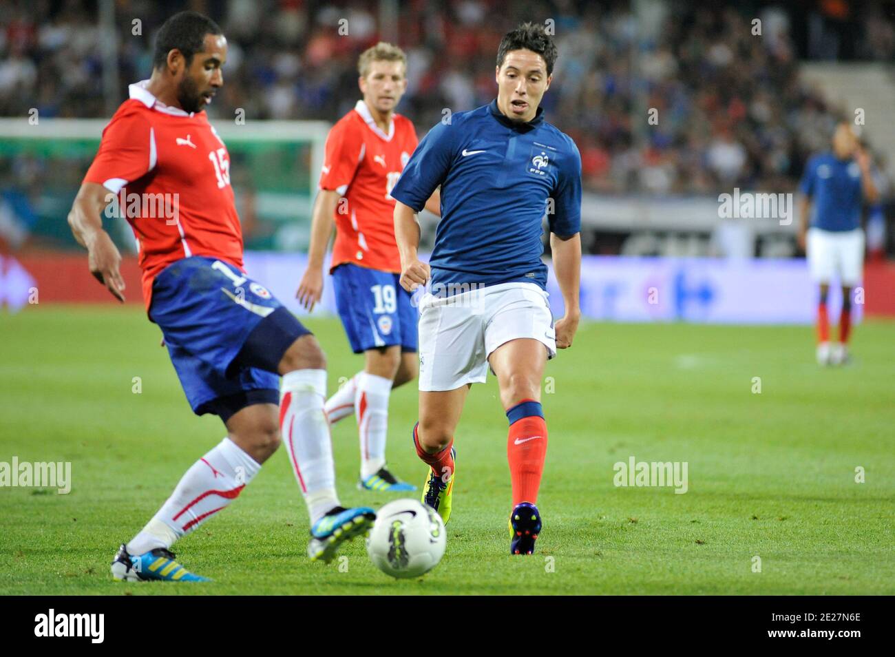 France's Samir Nasri fights for the ball with Chile's Jean Beausejour during International Friendly soccer match, France vs Chile at Stade de la Mosson in Montpellier, France on August 10, 2011. The match ended in a 1-1 draw. Photo by Sylvain Thomas/ABACAPRESS.COM Stock Photo