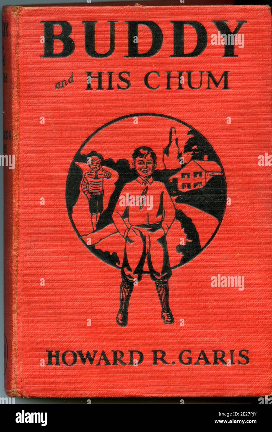 This is a vintage book with an illustrated cover. Title is Buddy and His Chum or A Boy's Queer Search. Illustrated. Published by Cupples & Leon, New York.  Copyright 1930 and written by Howard R. Garis. Stock Photo