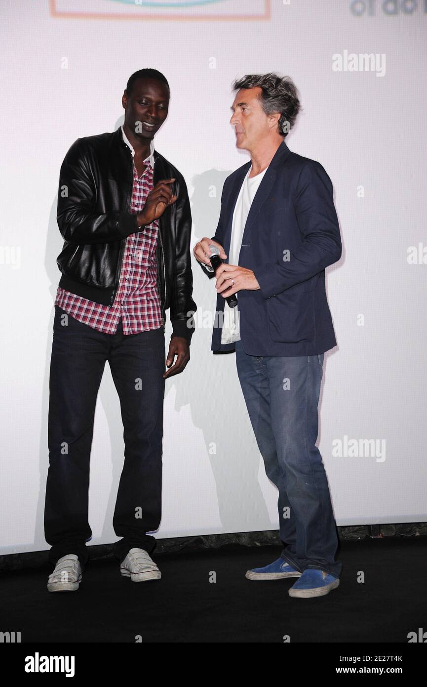 Omar Sy and Francois Cluzet during the opening ceremony of the 4th Festival Du film Francophone d'Angouleme in Angouleme, France on August 24, 2011. Photo by Giancarlo Gorassini/ABACAPRESS.COM Stock Photo