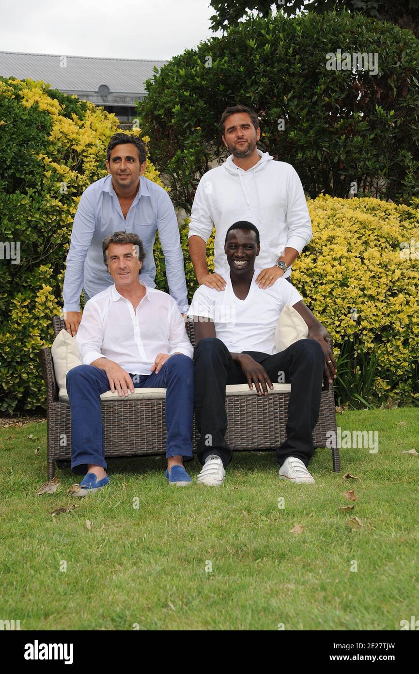 Directors Olivier Nakache, Eric Toledano with actors Francois Cluzet and Omar Sy pose for a the photocall ' Intouchable' during the 4th Festival Du film Francophone d'Angouleme in Angouleme, France on August 25, 2011 . Photo by Giancarlo Gorassini/ABACAPRESS.COM Stock Photo
