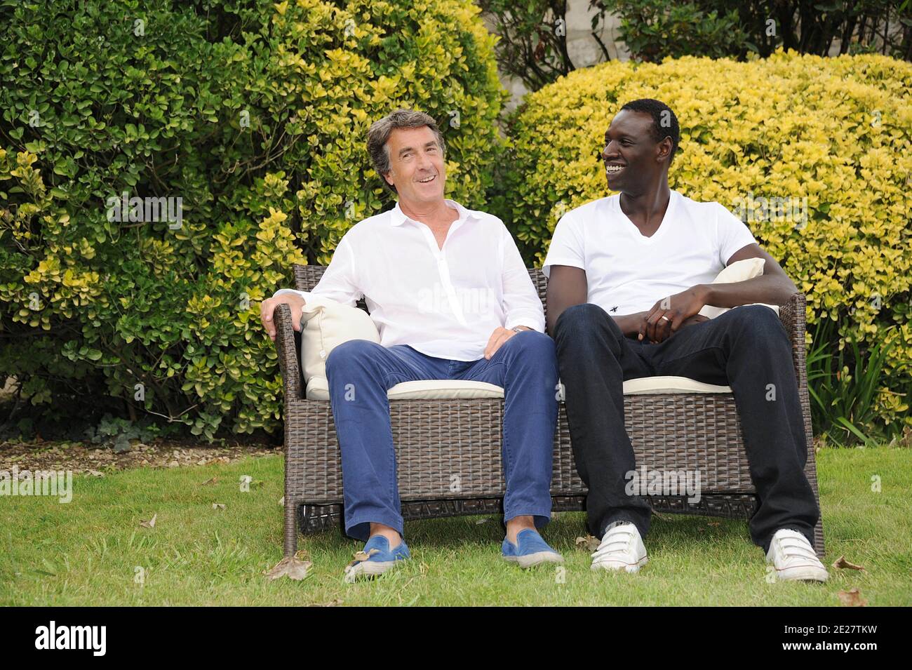 Francois Cluzet and Omar Sy pose for a the photocall ' Intouchable' during the 4th Festival Du film Francophone d'Angouleme in Angouleme, France on August 25, 2011 . Photo by Giancarlo Gorassini/ABACAPRESS.COM Stock Photo