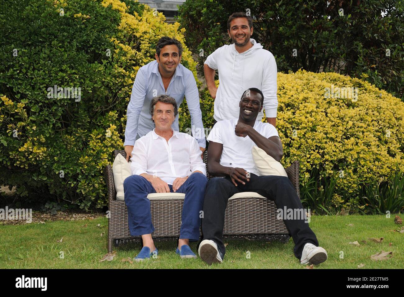 Directors Olivier Nakache, Eric Toledano with actors Francois Cluzet and Omar Sy pose for a the photocall ' Intouchable' during the 4th Festival Du film Francophone d'Angouleme in Angouleme, France on August 25, 2011 . Photo by Giancarlo Gorassini/ABACAPRESS.COM Stock Photo