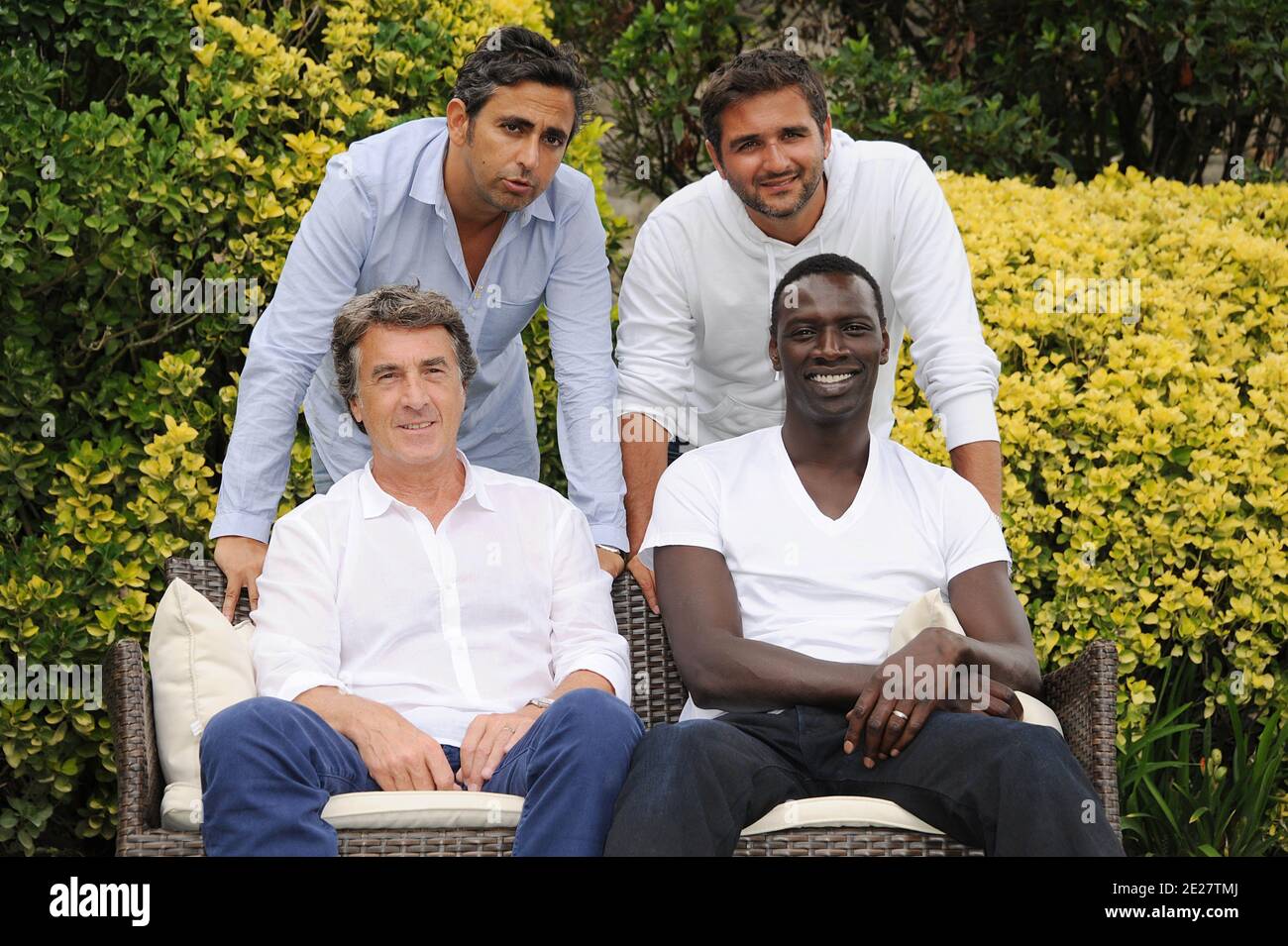 Directors Olivier Nakache, Eric Toledano with actors Francois Cluzet and Omar Sy pose for a the photocall ' Intouchable' during the 4th Festival Du film Francophone d'Angouleme in Angouleme, France on August 25, 2011 . Photo by Giancarlo Gorassini/ABACAPRESS.COM Stock Photo