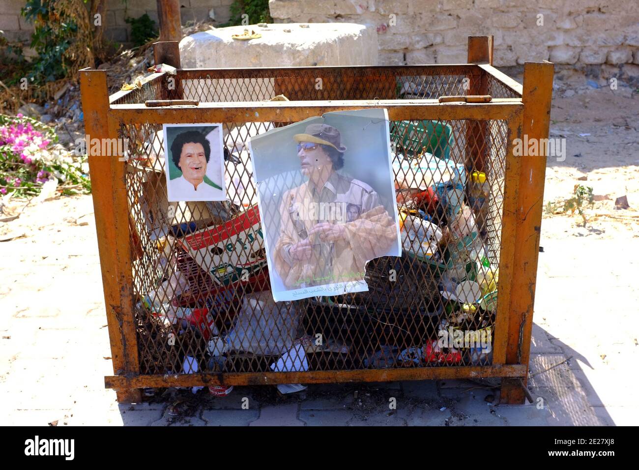 Libyan leader Gaddafi's portraits are displayed on garbage bin in Tripoli, Libya, as seen on August 28, 2011. Gaddafi developed an important cult of his image, and his portraits were everywhere in the country. Libyan rebels are now offering him a new face and a second 'narcissist' life... Photo by Ammar Abd Rabbo/ABACAPRESS.COM Stock Photo