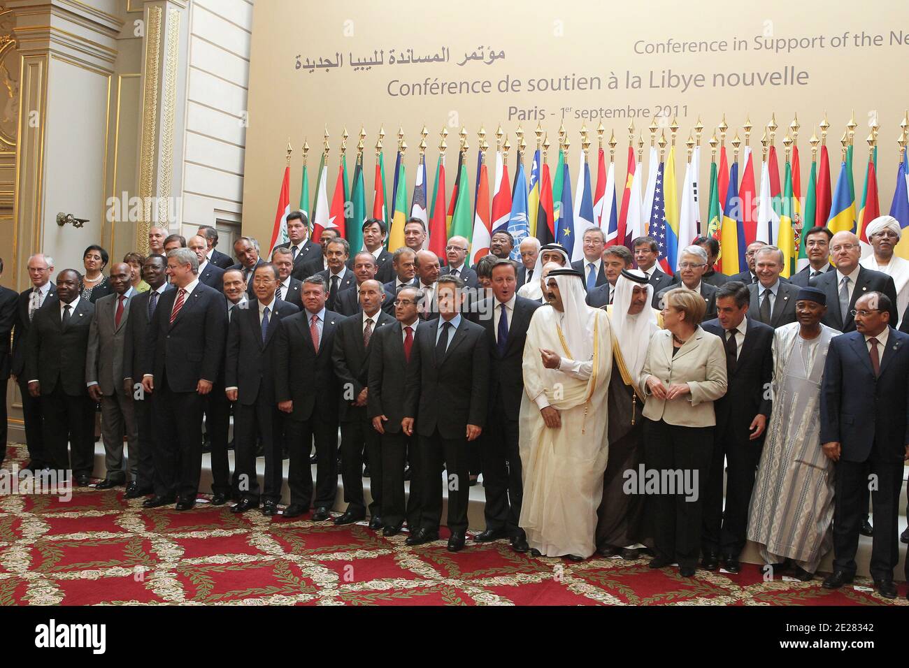 France's president Nicolas Sarkozy (C) poses with states' members and international organizations representatives as part of a summit on the post-Kadhafi era at the Elysee Palace in Paris, France on Sptember 1, 2011 (1srt row-RtoL) Kuwait's vice prime minister and foreign minister Cheikh Mohamed Sabah Al Salem Al Sabah United Kingdom's Prime Minister David Cameron; Sarkozy; number two in the rebels' NTC, Mahmud Jibril; Chairman of Libya's rebel Transitional National Council, Moustapha Abdel Jalil; King of Jordan Abdullah II; Secretary-General of the United Nations Ban Ki Moon. Photo by Thierry Stock Photo