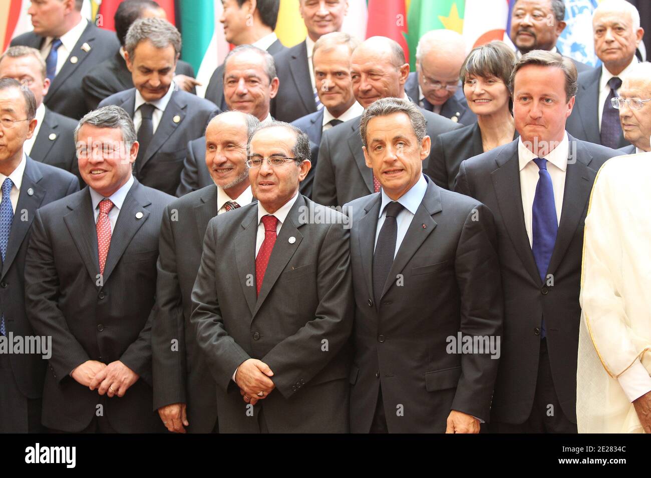 France's president Nicolas Sarkozy (C) poses with states' members and international organizations representatives as part of a summit on the post-Kadhafi era at the Elysee Palace in Paris, France on Sptember 1, 2011 (1srt row-RtoL) Kuwait's vice prime minister and foreign minister Cheikh Mohamed Sabah Al Salem Al Sabah United Kingdom's Prime Minister David Cameron; Sarkozy; number two in the rebels' NTC, Mahmud Jibril; Chairman of Libya's rebel Transitional National Council, Moustapha Abdel Jalil; King of Jordan Abdullah II; Secretary-General of the United Nations Ban Ki Moon. Photo by Thierry Stock Photo