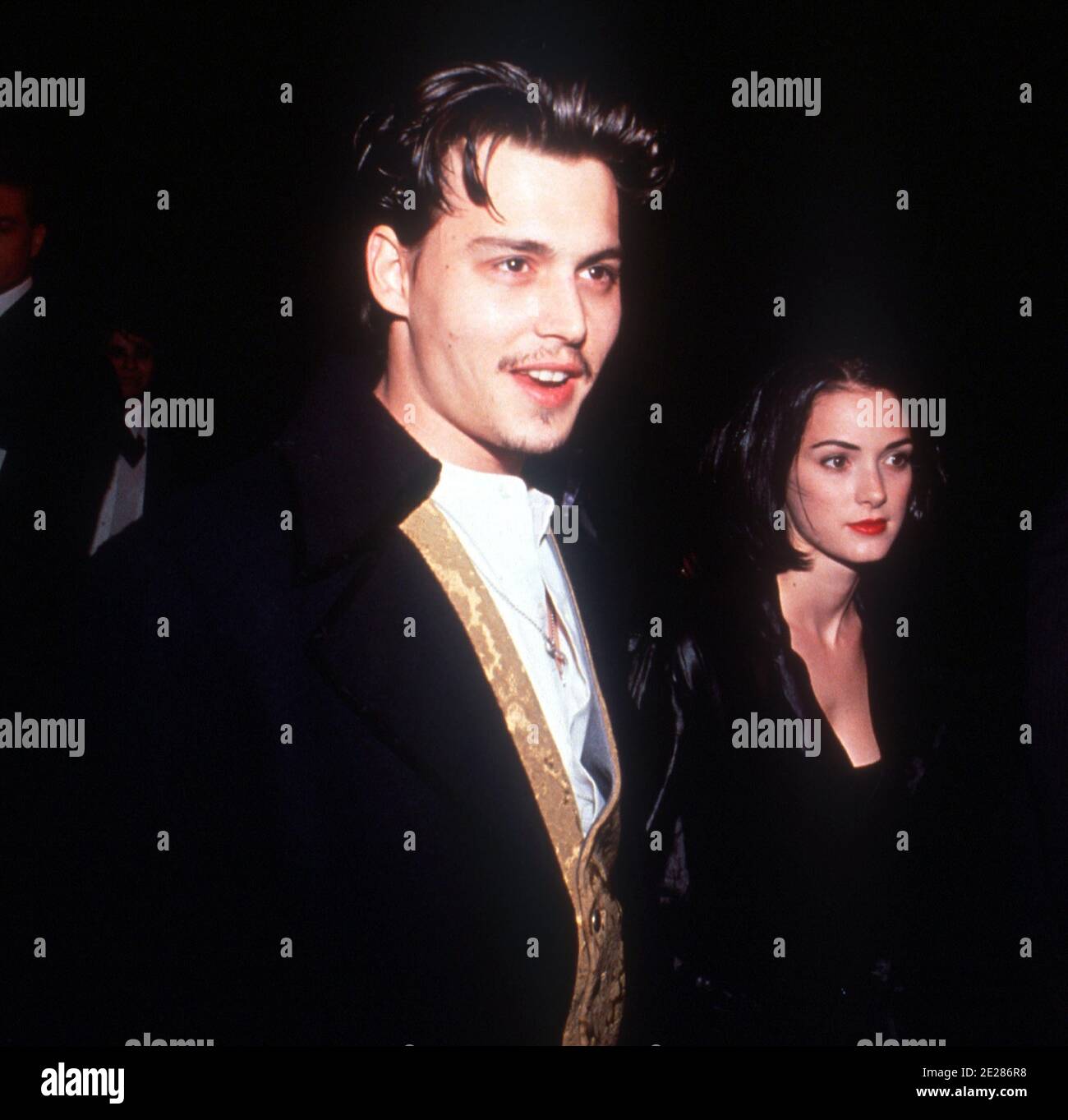 Winona Ryder and Johnny Depp at the  'Edward Scissorhands' Premiere in Los Angeles, California. December 6, 1990. Credit: Ralph Dominguez/MediaPunch Stock Photo