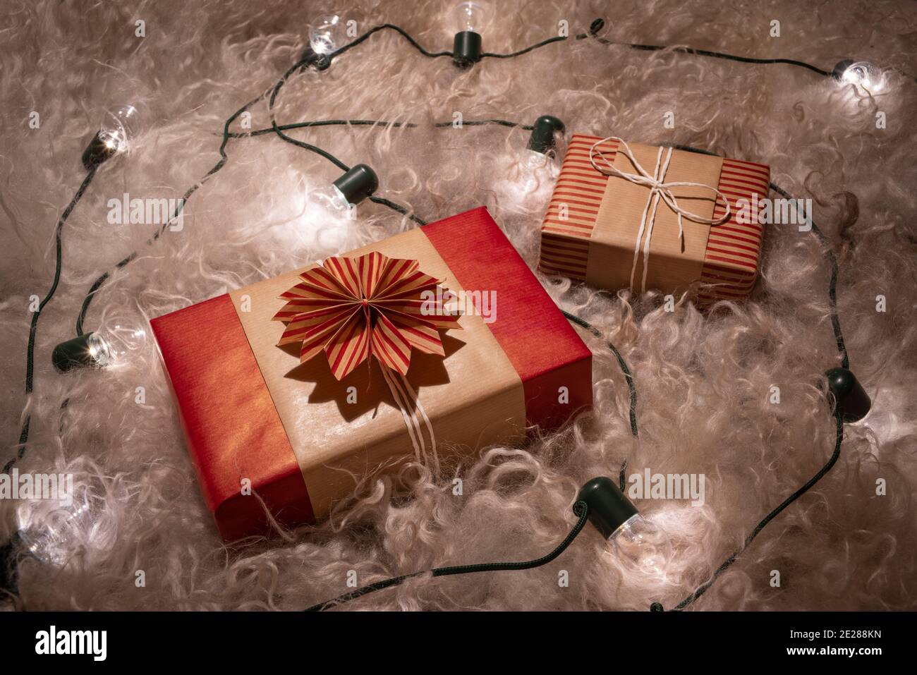 Handmade Decorative Gift Boxes under the Christmas tree with glowing