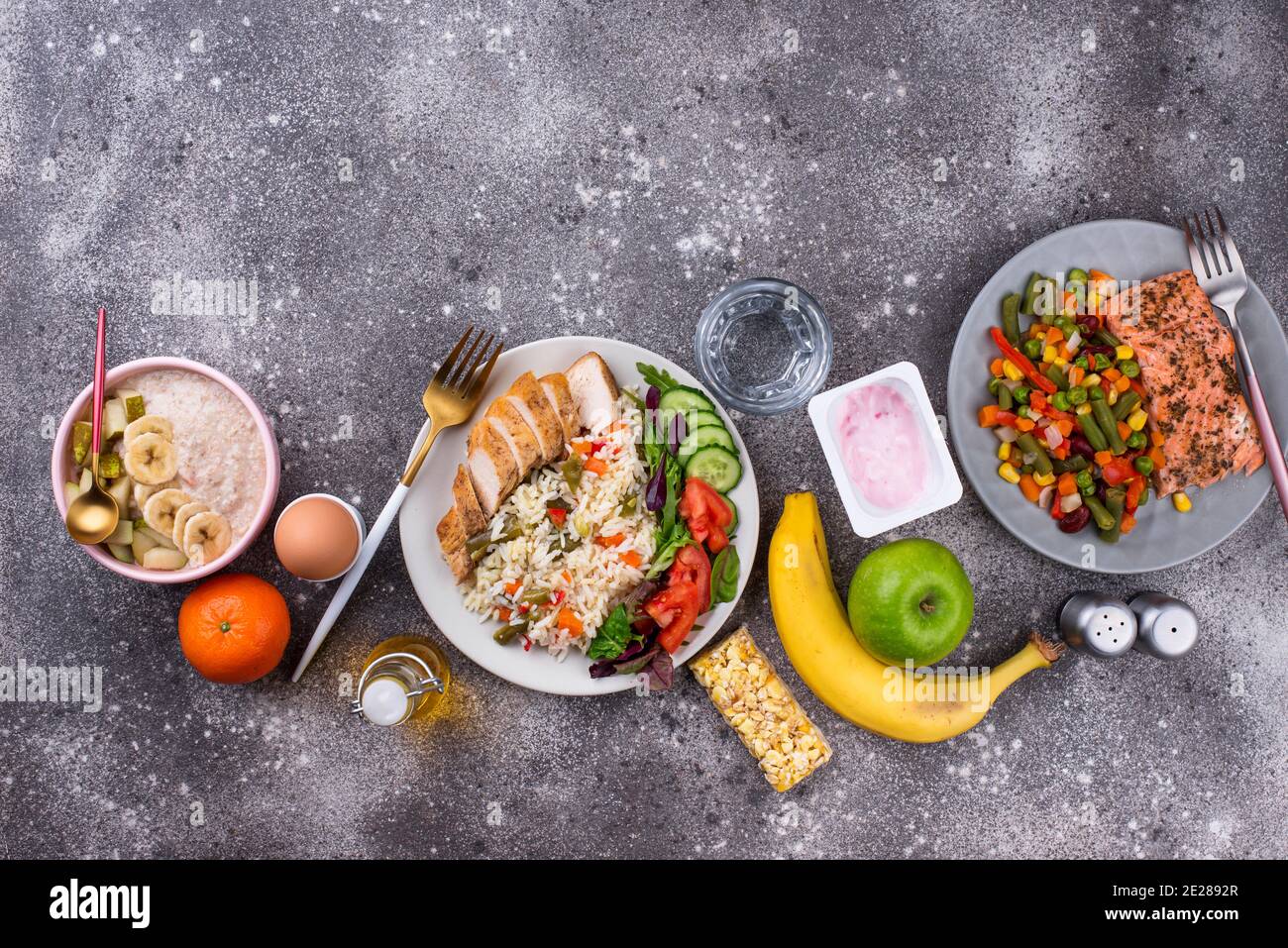 Breakfast, lunch and dinner. Balanced menu Stock Photo - Alamy