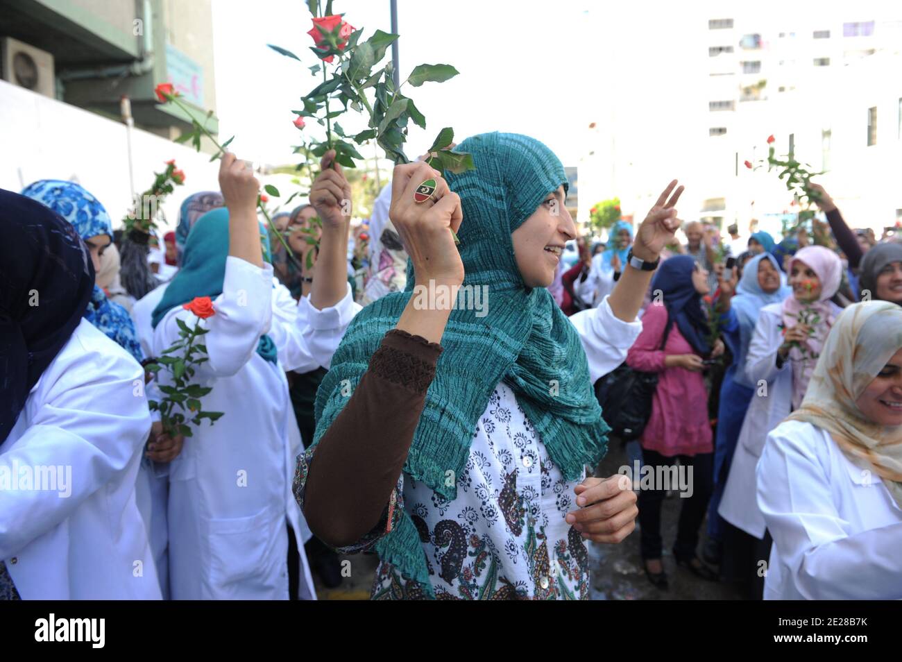 Libyan doctors and nurses from the Children Hospital celebrate their new colors, nearly 3 weeks