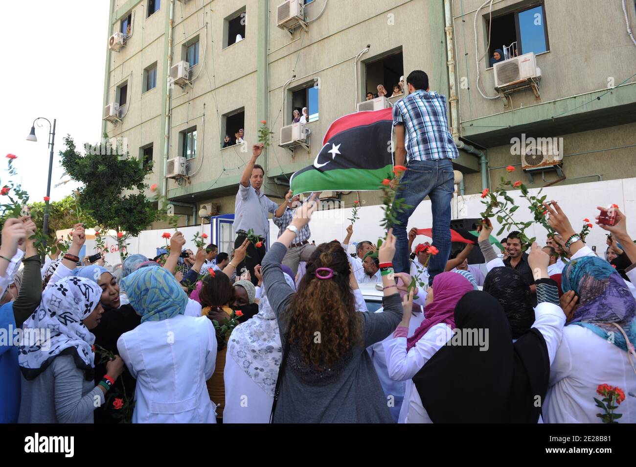 Libyan doctors and nurses from the Children Hospital celebrate their new colors, nearly 3 weeks