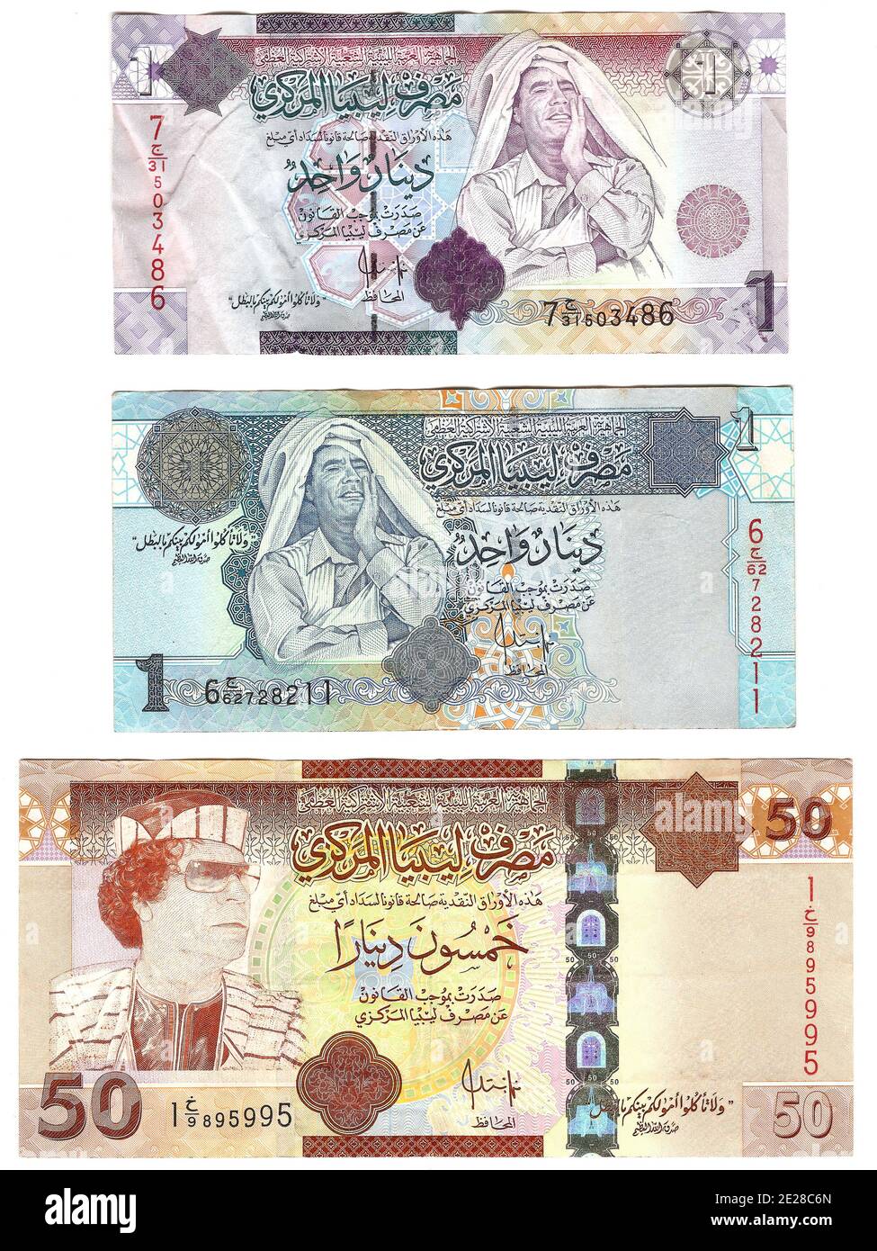 Libyan banknotes of 1 dinar (above and center) and 50 dinars, bearing Gaddafi's image, seen in Tripoli, Libya, on September 9, 2011. Photo by Ammar Abd Rabbo/ABACAPRESS.COM Stock Photo