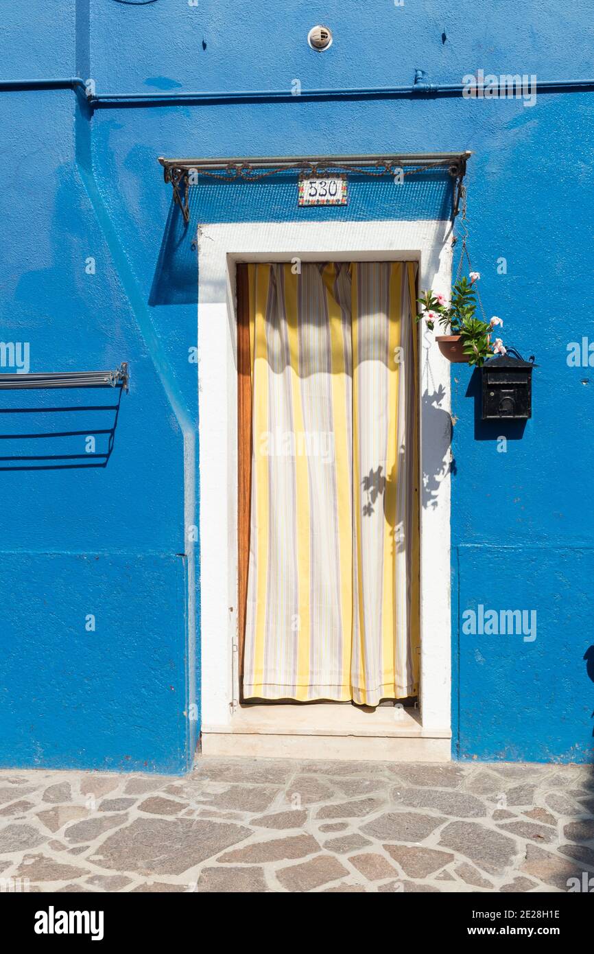 Burano Venice Italy Blue painted house and door Stock Photo - Alamy