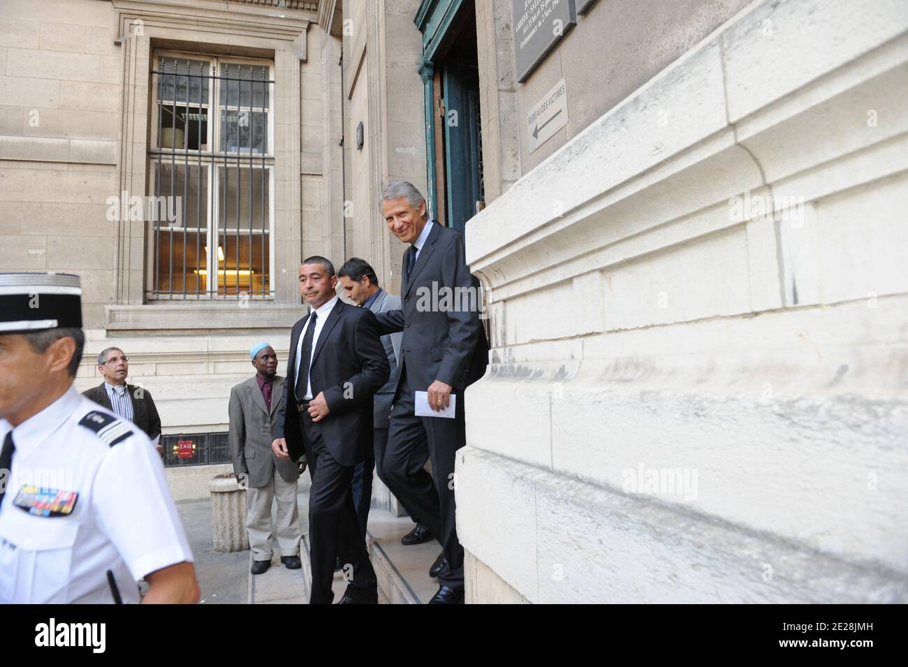 Former French Prime Minister Dominique de Villepin leaves the Court of Appeals after being discharged in the Clearstream case, in Paris, France on September 14, 20111. De Villepin was accused, cleared and then convicted of plotting to discredit him by failing to stop the so-called Clearstream corruption inquiry in 2004. Photo by Mousse/ABACAPRESS.COM Stock Photo