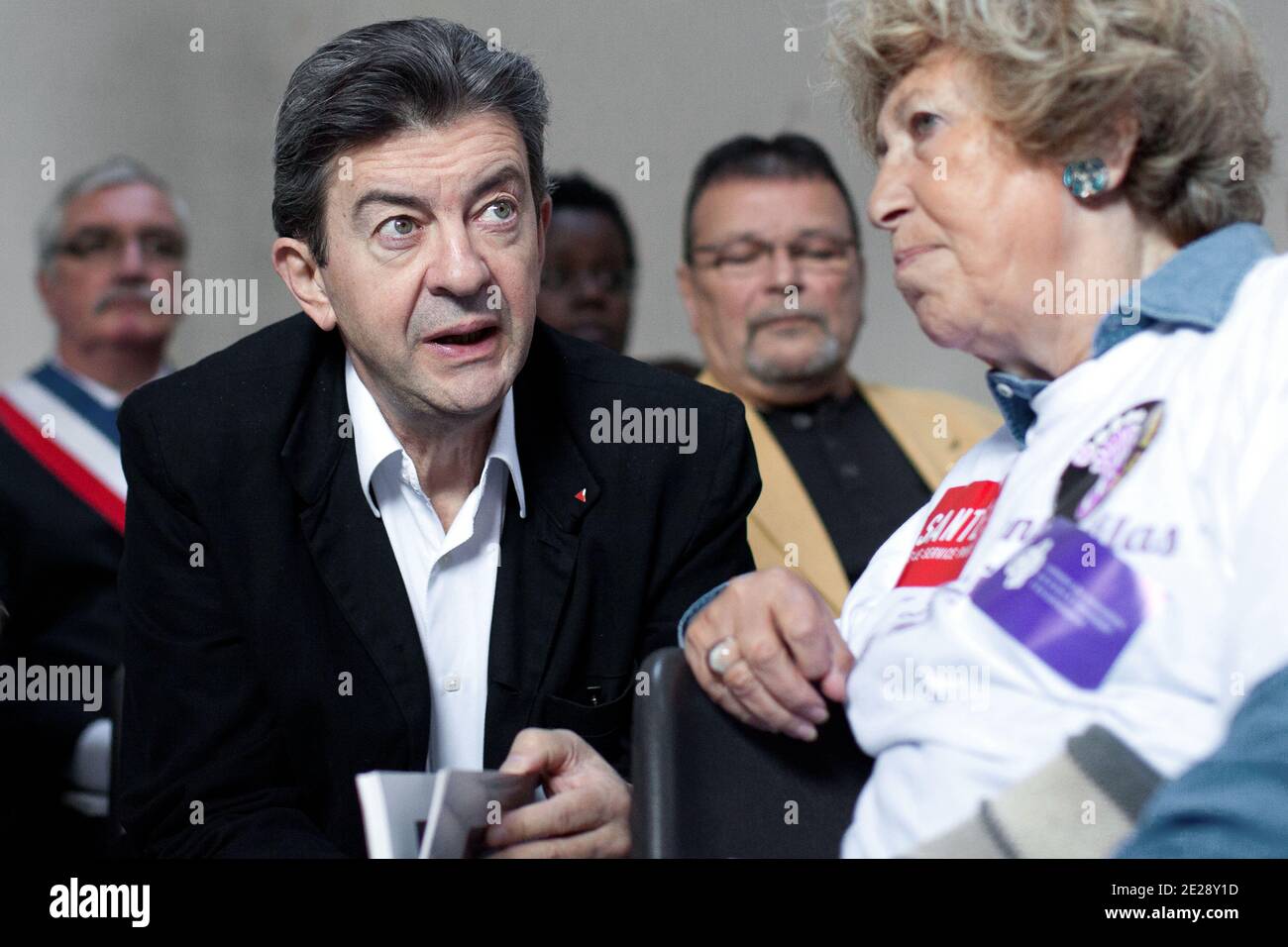 Front de Gauche candidate Jean-Luc Melenchon talks with Maya Surdut during a press conference next to a gathering of the personal of the maternity of the Lilas for the maintenance and the rebuilding the maternity, in Les Lilas, suburbs of Paris, France on September 24, 2011. Photo by Stephane Lemouton/ABACAPRESS.COM Stock Photo