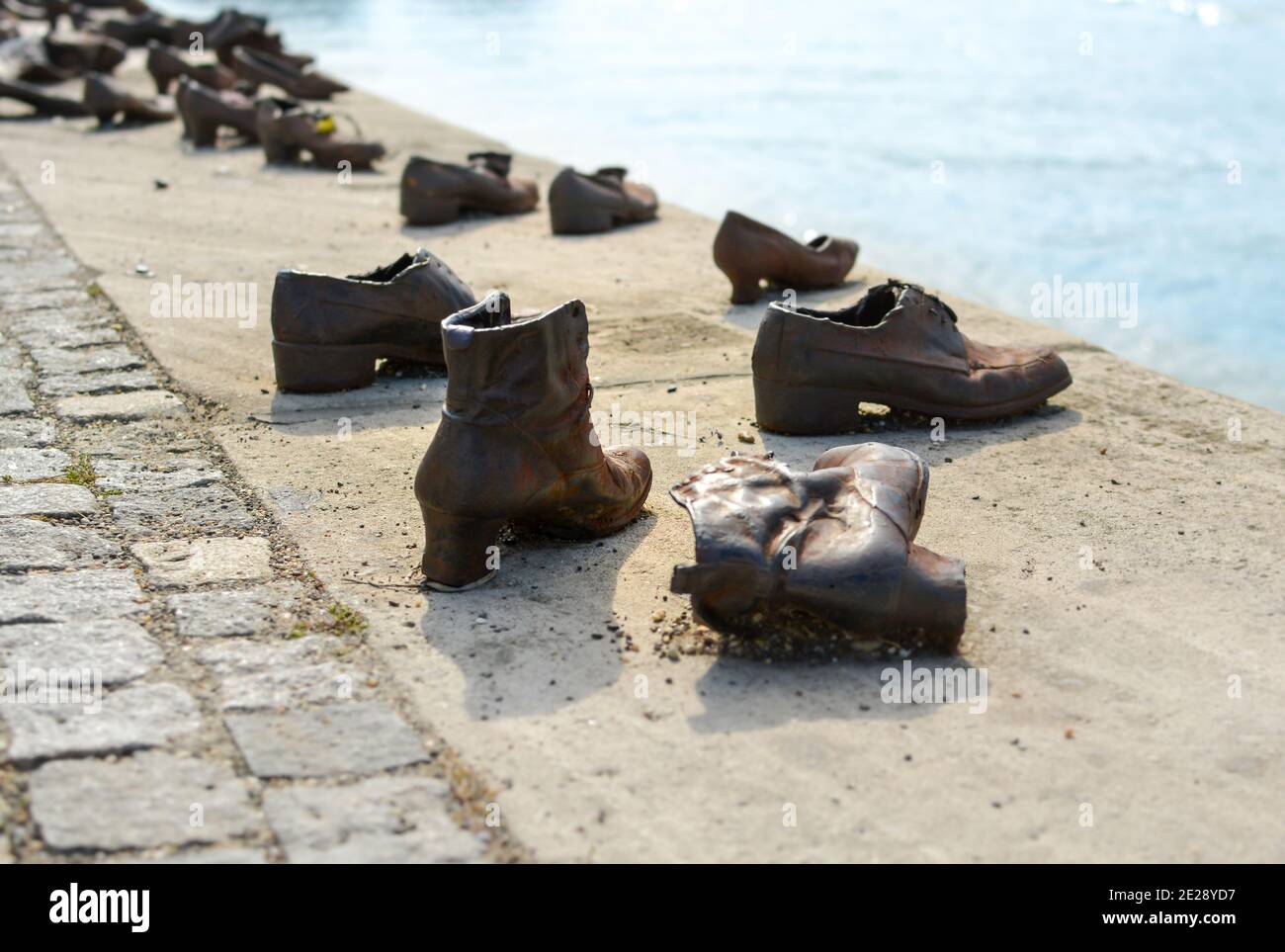 The shoes on the banks of the Danube river monument to the victims of Nazi repression erected on April 16 2005 in Budapest Hungary Stock Photo