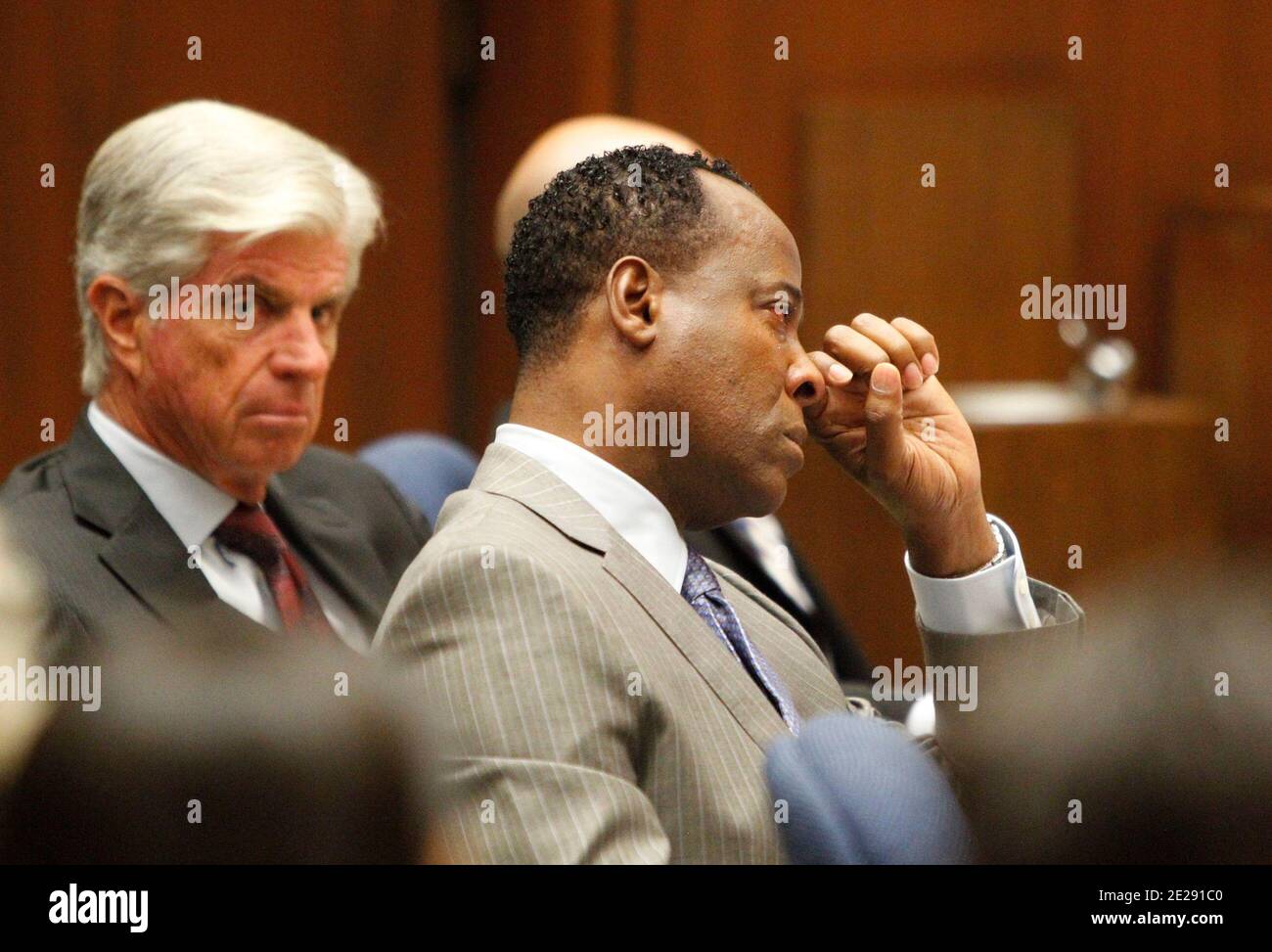 Conrad Murray wipes a tear during the defense opening arguments in his involuntary manslaughter trial at Superior Court in downtown, Los Angeles, CA on September 27, 2011. Photo by Al Seib/Pool/ABACAPRESS.COM Stock Photo