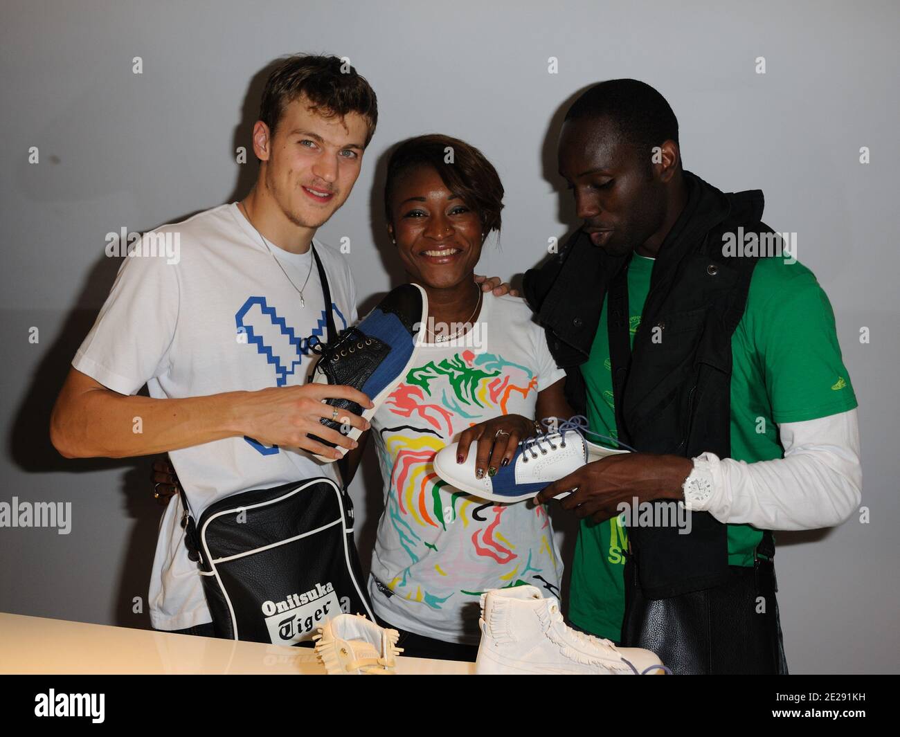 Christophe Lemaître ,Antoinette Nana Djimou Ida, Leslie Dhjone attends Asics and Shoes-Up new shoes 'Retro Rocket' launch party in L'imprimerie ,in Paris, France, on september 27, 2011. Photo by Alban Wyters/ABACAPRESS.COM Stock Photo