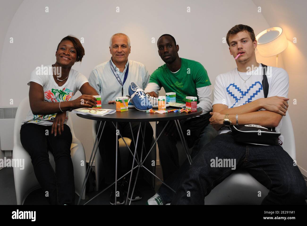 Christophe Lemaître ,Antoinette Nana Djimou Ida, Leslie Dhjone , Didier Dreulle (Asics France PDG) attends Asics and Shoes-Up new shoes 'Retro Rocket' launch party in L'imprimerie ,in Paris, France, on september 27, 2011. Photo by Alban Wyters/ABACAPRESS.COM Stock Photo