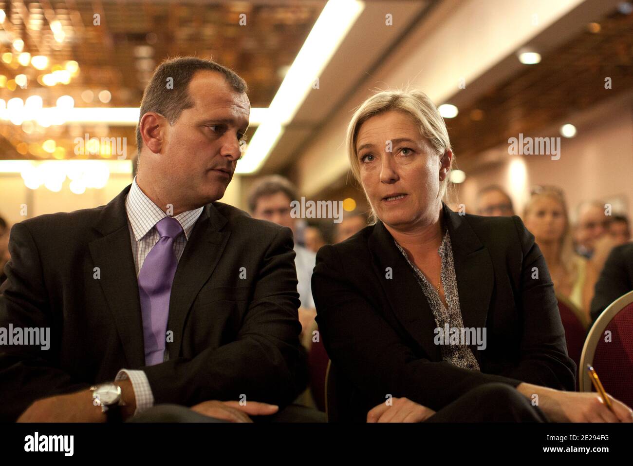 President of French far-right party Front national and candidate for the  next presidential elections, Marine Le Pen and Louis Aliot attend during a  debate on the education and school systems, as part