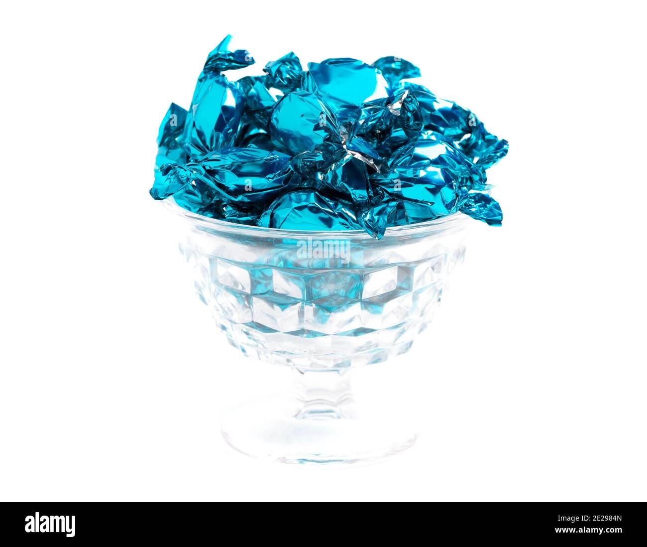 A Bowl of Blue Wrapped Candy Isolated on a White Background Stock Photo ...