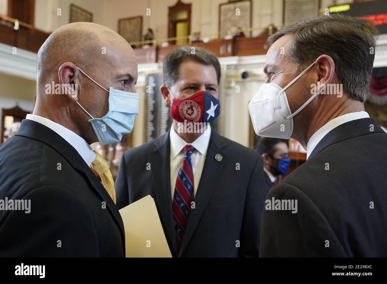 Austin, Texas January 12, 2021: State Rep. Matt Shaheen , R-Plano,  Rep. Scott Sanford, R-McKinney, and Rep. Trent Ashby, R-Lufkin greet each other on the floor prior to the opening of the 87th Session of the Texas Legislature. Credit: Bob Daemmrich/Alamy Live News Stock Photo