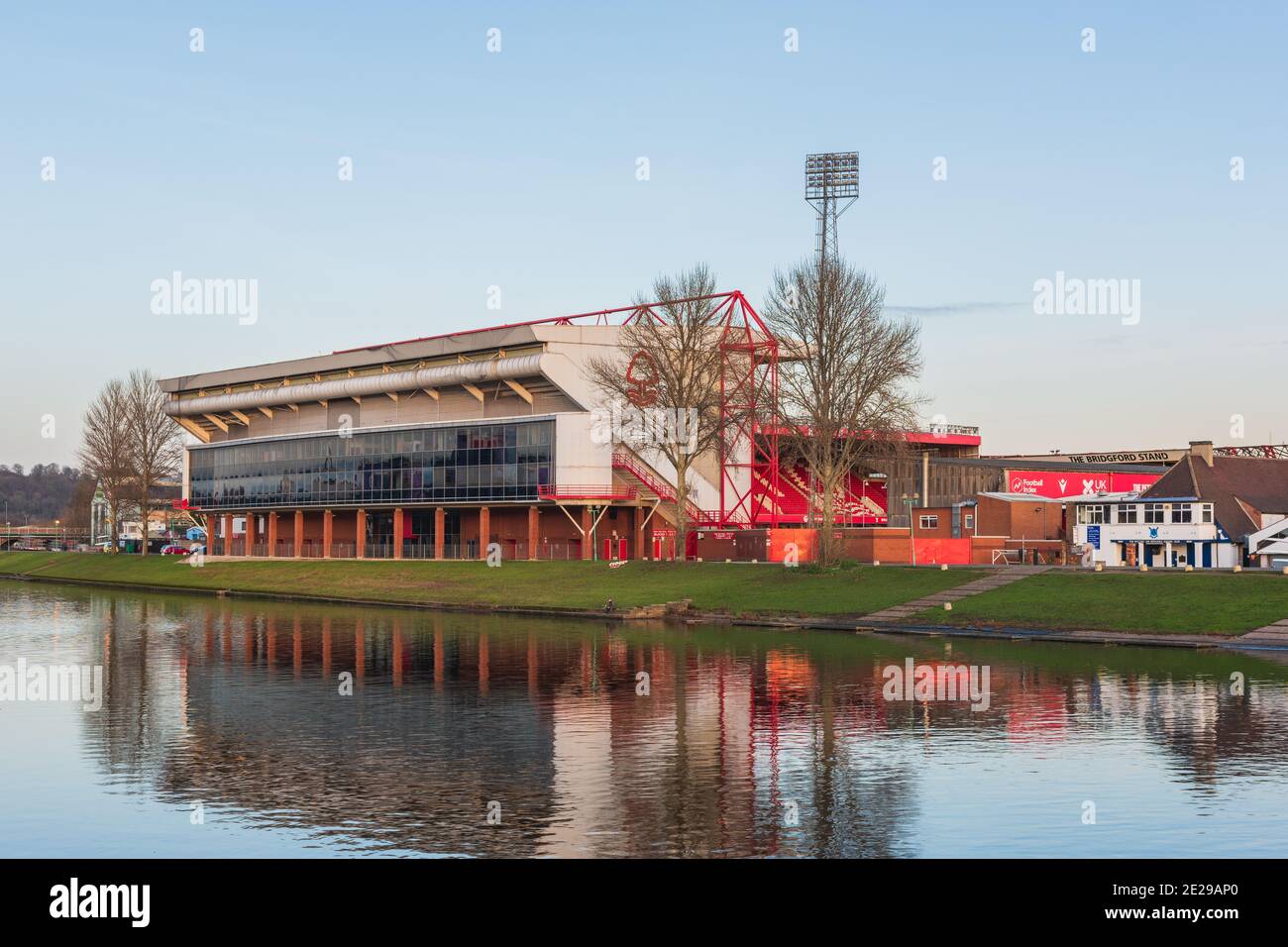The famous Trent Bridge over the river with the Nottingham Forest City Ground in the background at West Bridgford in Nottingham, United Kingdom. Stock Photo